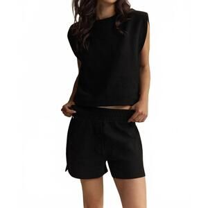 NEW LUNE ACTIVE moon padded shoulder top in black